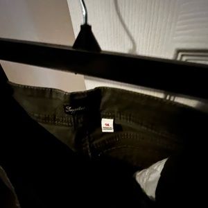 Camo colored pants with zipper pockets in front. No tags but never worn.